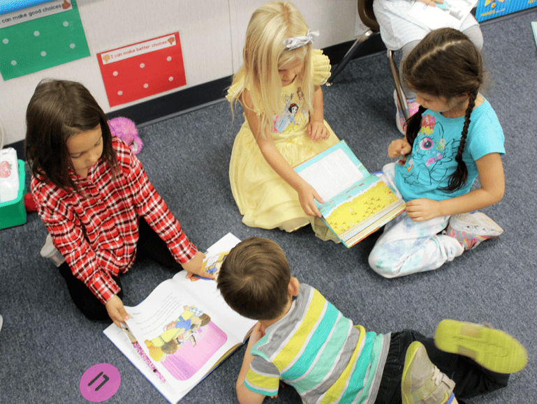 Redeemer Preschool students reading together