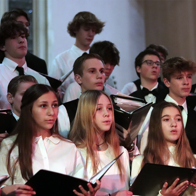 Upper school choir singing as part of a musical program from Maryland private school