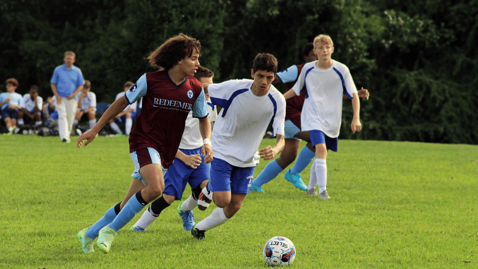 Redeemer varsity soccer team winning against opponent in Baltimore, Maryland